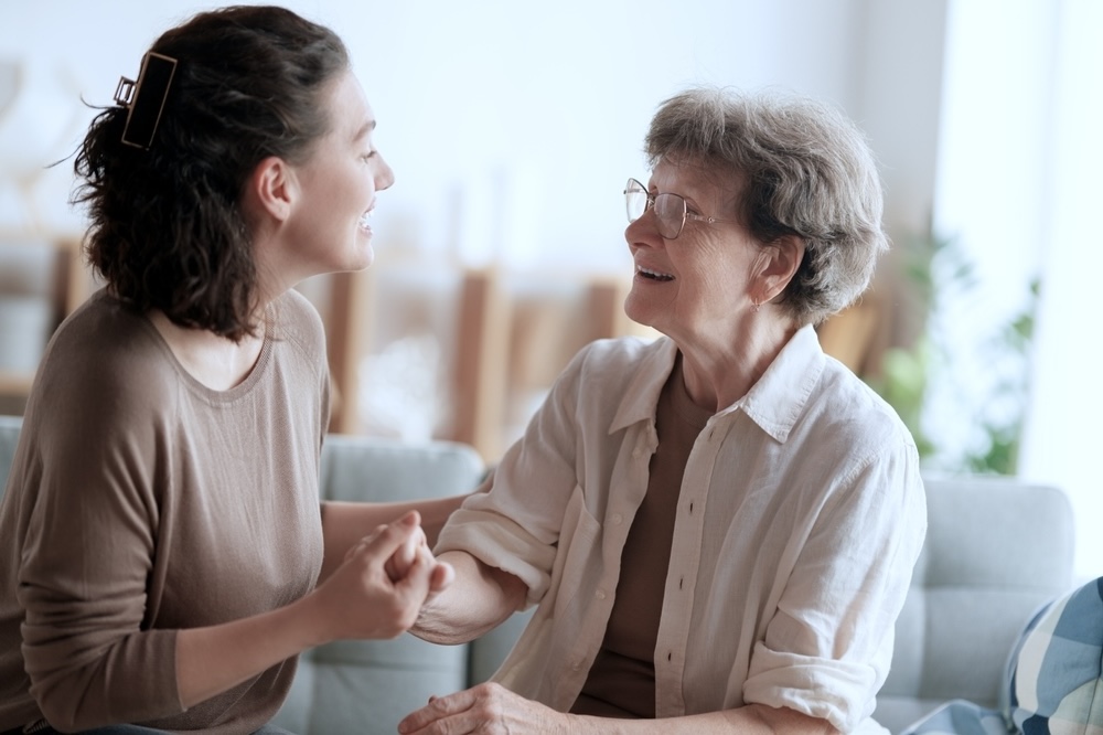 Senior female patient with a caregiver loved one dropping her for respite care