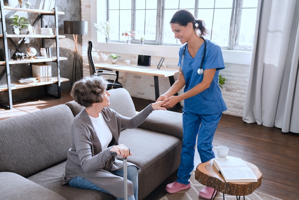 Nurse with an elderly patient in skilled nursing facility